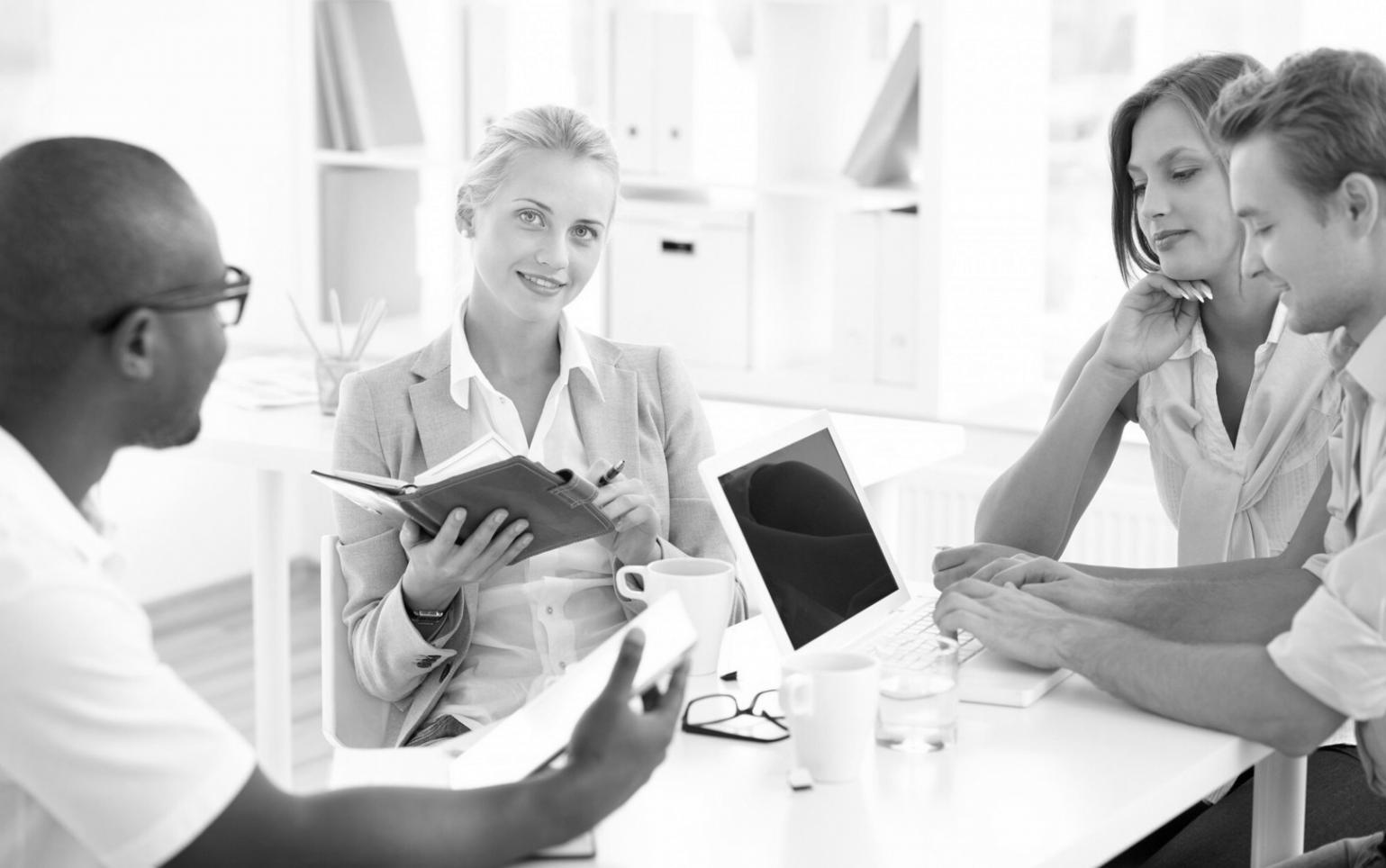 Business meeting discussing budget priorities and financial decisions